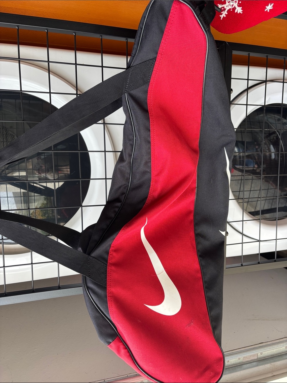 Nike Red and Black Sling Duffel with White Swoosh Accent